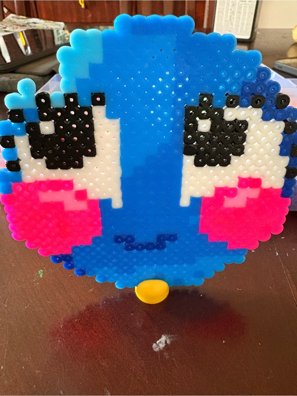 Blue Pixel Bead Toy with Pink Cheeks